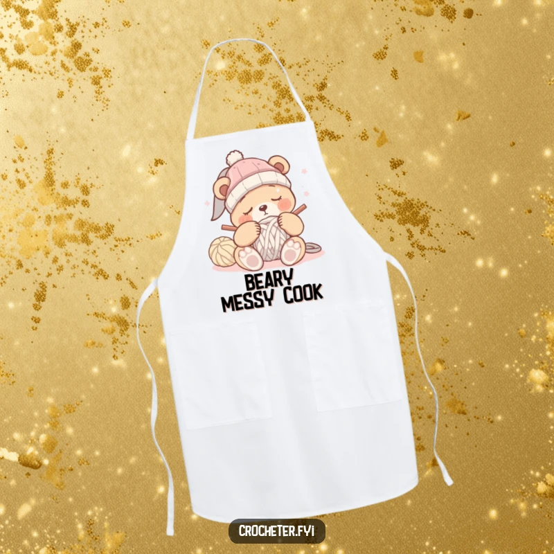 Funny sleepy bear crochet apron showing a bear dozing off while trying to crochet a hat, ideal for crafting.