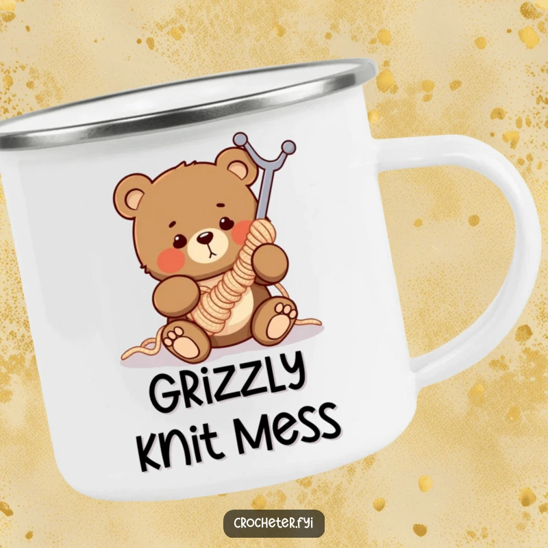 Funny enamel camping mug with a clumsy bear humorously tangled in a gigantic crochet hook, perfect for outdoor crafters.