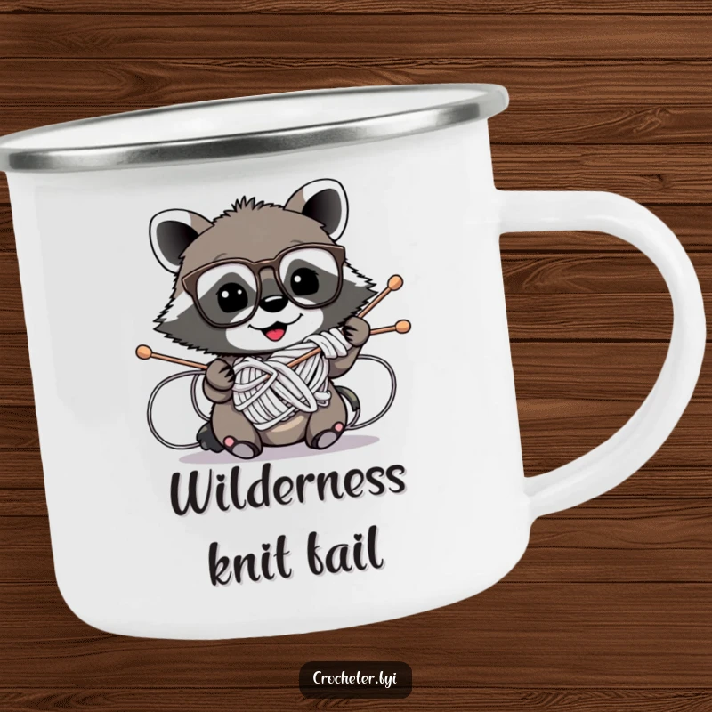 Funny enamel camping mug with a mischievous raccoon wearing glasses hilariously tangled in knitting needles, perfect for outdoor knitters.