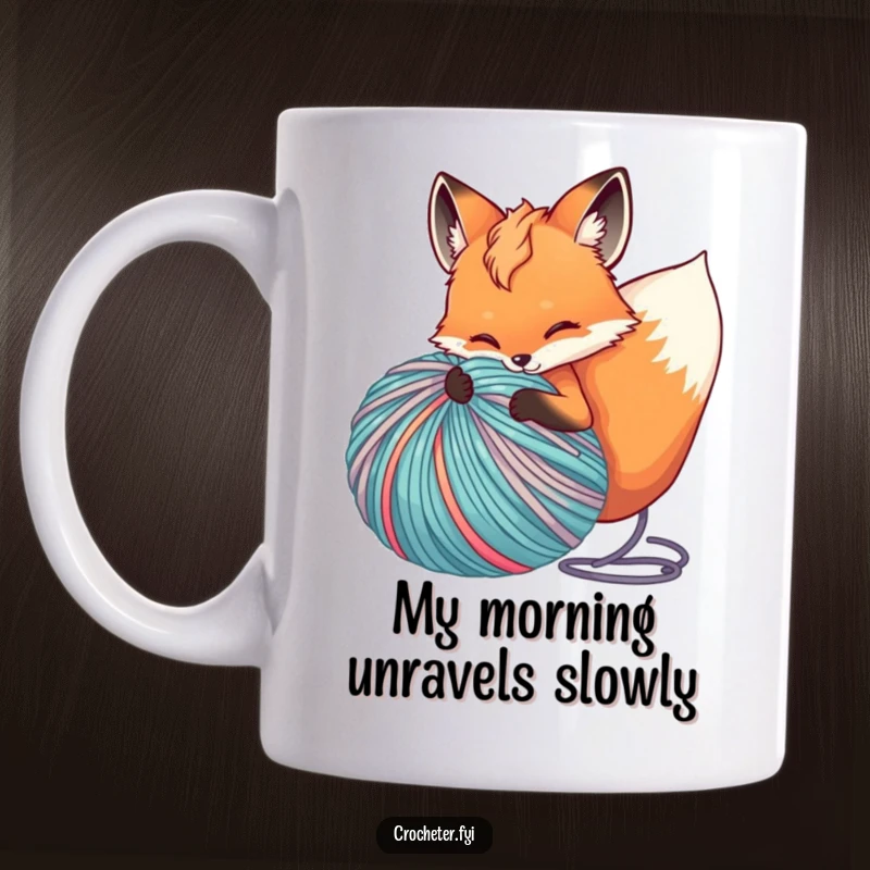Funny mug with a mischievous fox in the process of unfurling a huge, colorful ball of yarn, showcasing playful chaos.