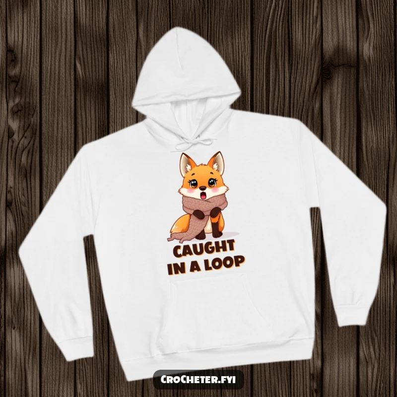 Funny surprised fox hoodie caught in a giant crocheted scarf, a warm and humorous item.
