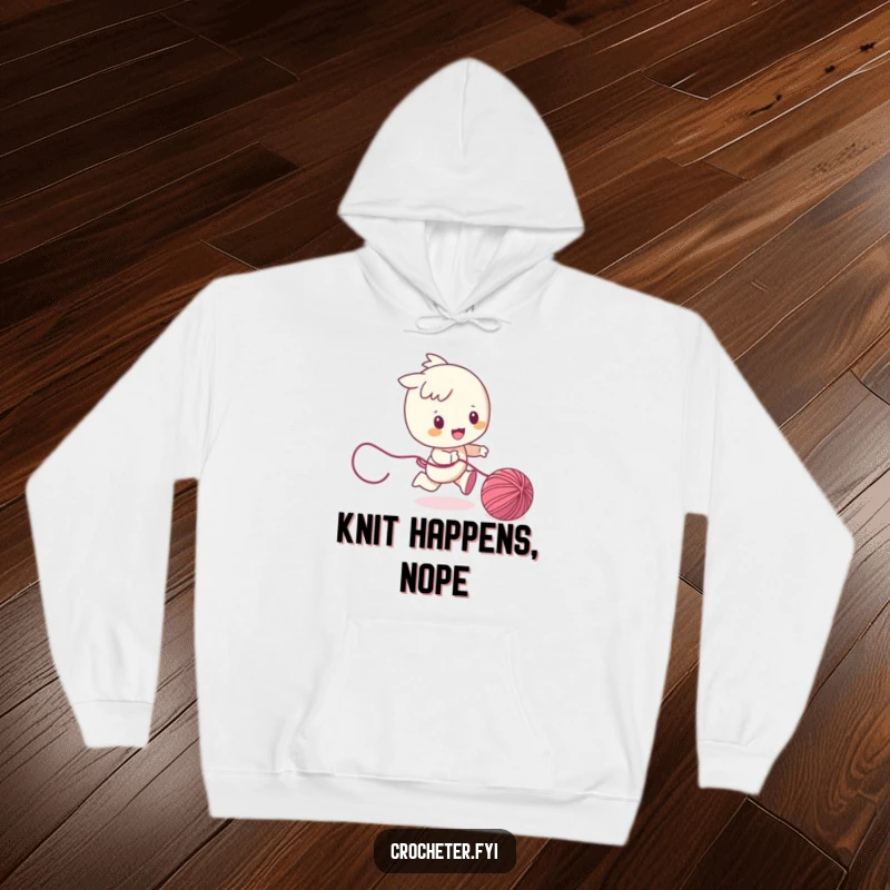 Funny hoodie featuring a character playfully chasing a ball of yarn, offering cozy comfort with a delightful touch of whimsical action.