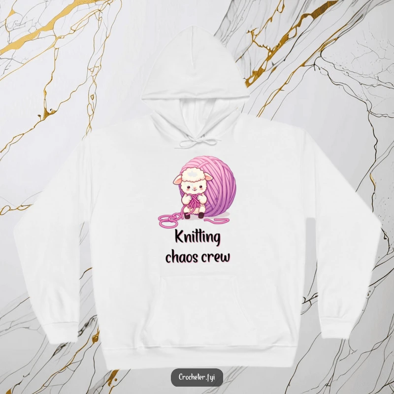 Funny Sheep Hoodie showing a small, fluffy sheep character in a comical struggle with a giant, tangled ball of yarn, perfect for cozy crafting.