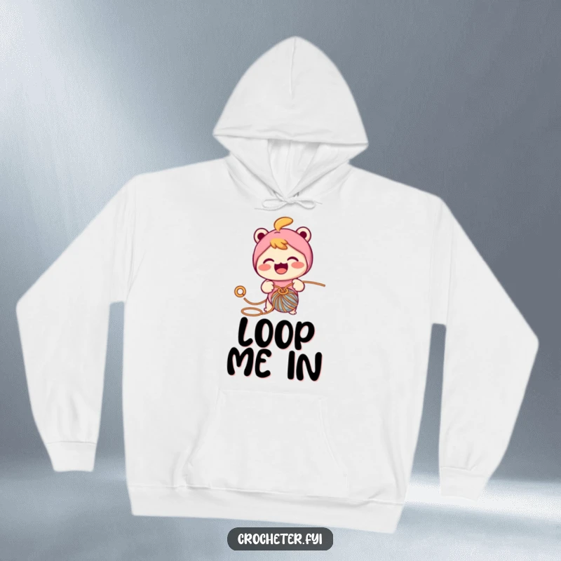 Funny hoodie with a cheerful character energetically crocheting, pulling yarn through a loop with a hook, perfect for cozy crafting.