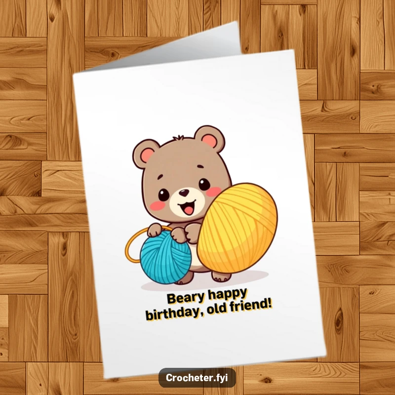 Funny free printable birthday card: a smiling bear happily winding a giant ball of colorful yarn, ready for gift wrapping.