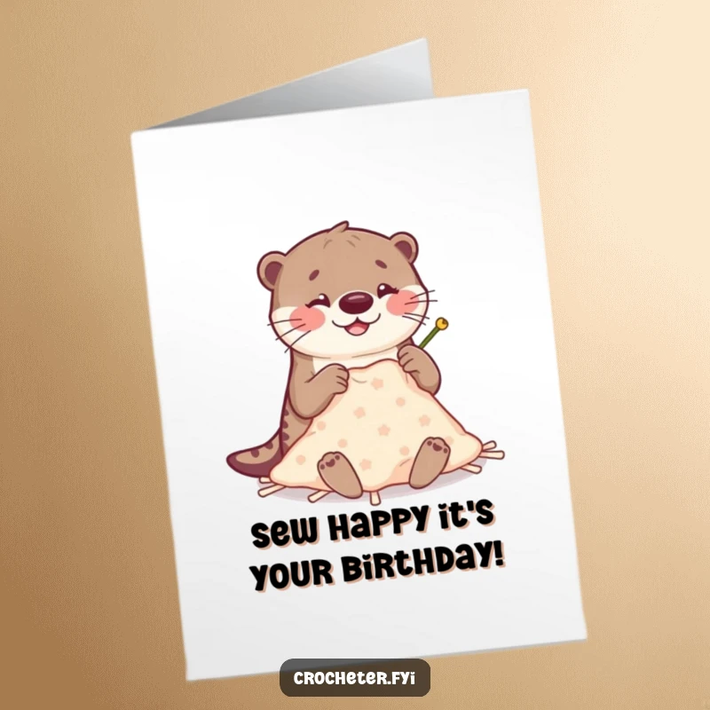 Funny Free Printable Birthday Card of a happy otter clumsily sewing a tiny blanket with big needles, a DIY gift idea