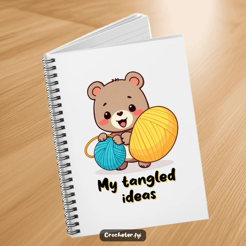 Funny notebook cover with a happy bear character winding a large ball of yarn, perfect for jotting down creative plans.